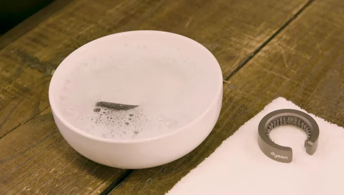 Rinse thoroughly to remove soap and debris. Shake off excess water.