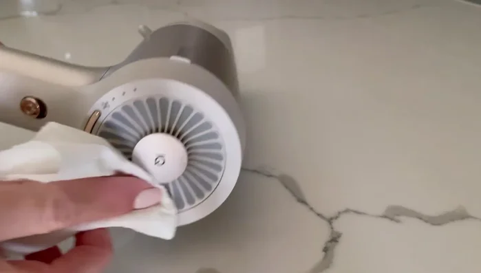 Dry the filter: Pat the filter dry with a clean cloth or paper towel. Repeat steps 2 & 3 as needed until clean.