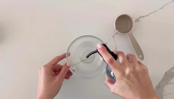 Prepare cleaning solution: Mix 1/4 cup warm water with 5 drops of dish soap. Brush the filter with a brush or toothbrush to remove loose debris.