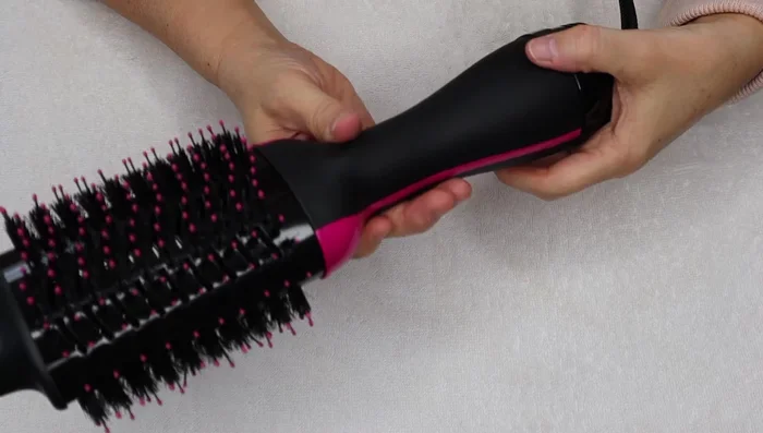 Use a soft cloth to wipe away excess water and let the hair dryer air dry completely.