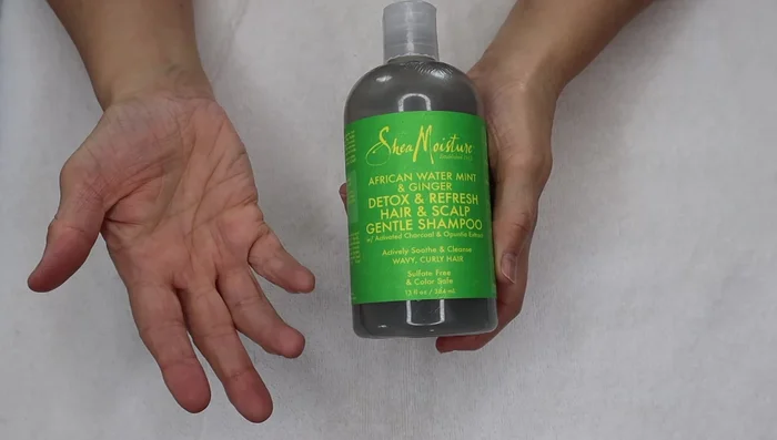 Prepare a shampoo mixture: Mix shampoo and warm water in a spray bottle (approximately 2 tablespoons of shampoo).