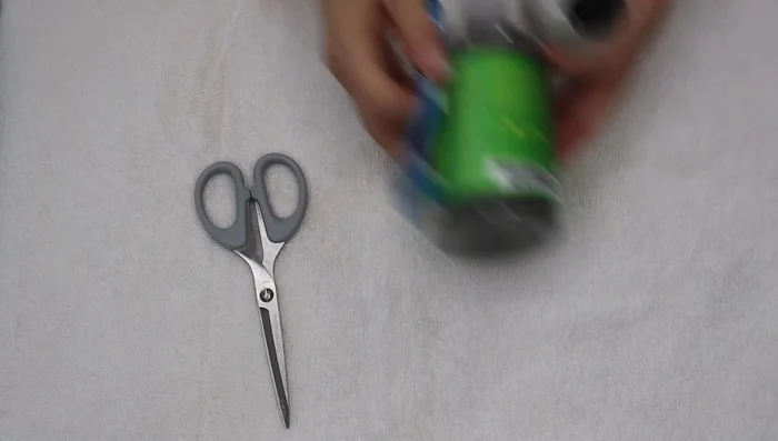 Cut away excess hair from the brush using scissors.