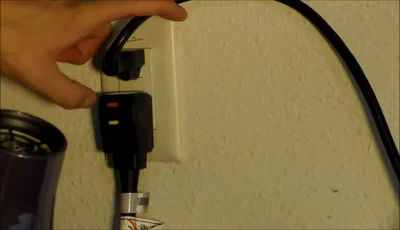 Plug it back in and press the reset button.