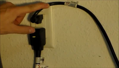 Plug it back in and press the reset button.