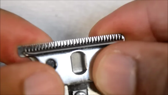 Check the gap between the blades with your fingernail. There should be a tiny space.