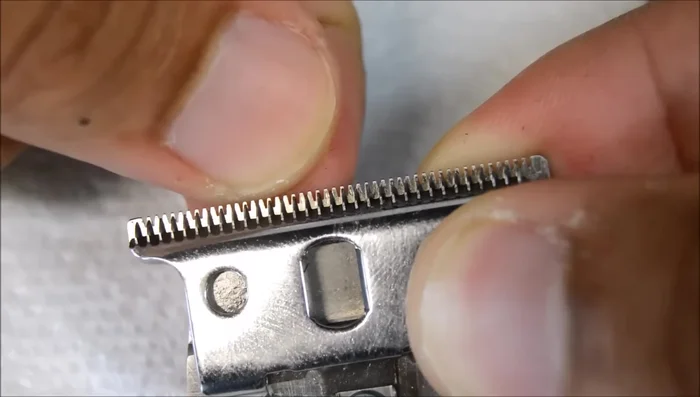 Check the gap between the blades with your fingernail. There should be a tiny space.