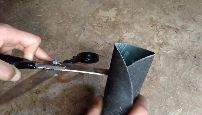 Continue rubbing the seasoning onto the edges of the blades until clean.