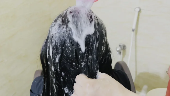 Shampoo your hair. Dilute shampoo in water before applying to avoid direct contact with the hair, ensuring a gentle cleanse. Do not rub vigorously; gently press and clean the scalp.