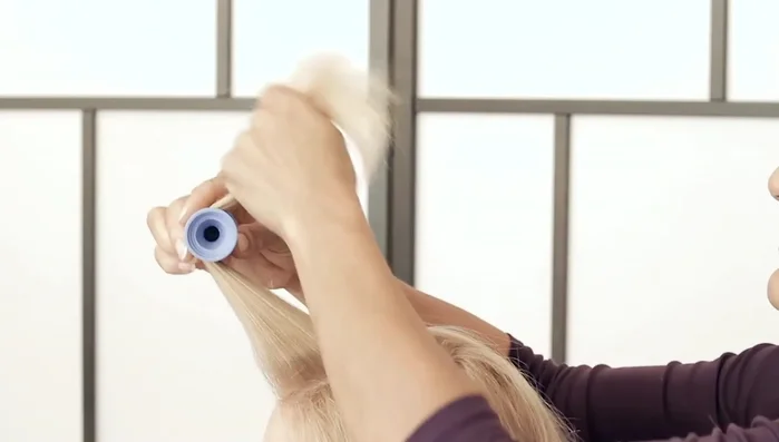 Maintain tension and angle: Keep tension on the hair while rolling to avoid loose curls and ensure the roller sits on its base for optimal lift.