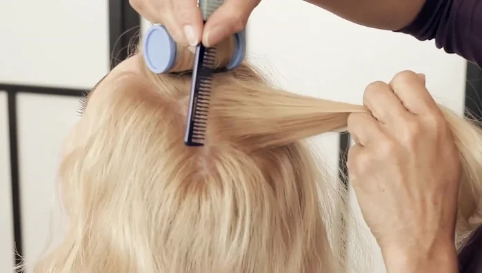 Addressing layers: For layered hair, begin rolling from where the layers start to prevent hair from falling out of the roller.