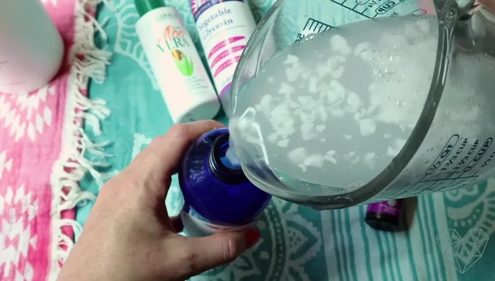 Pour the mixture into a spray bottle.