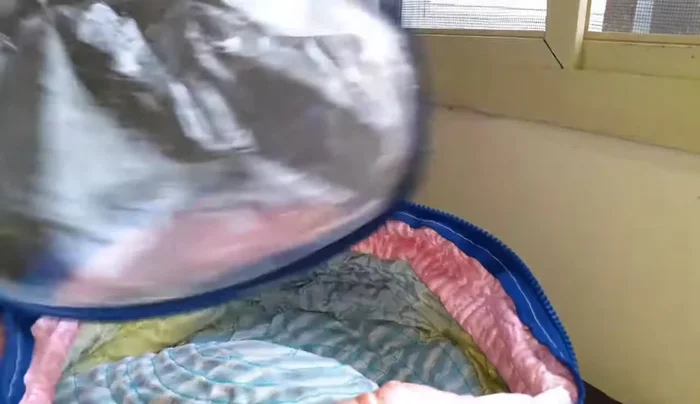 Reinsert the liner into the heat cap, zipping it closed.