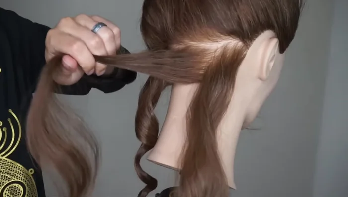 Repeat: Continue curling sections until the desired amount of hair is curled.