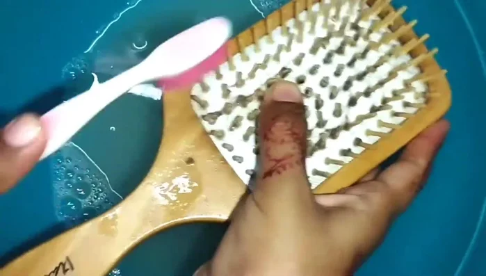 Rinse thoroughly: Rinse the brush under running water until all the cleaning solution and dirt are removed.