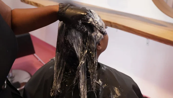 Processing Check: Check for proper processing by pressing the comb on the base; a slight indent indicates readiness to rinse.