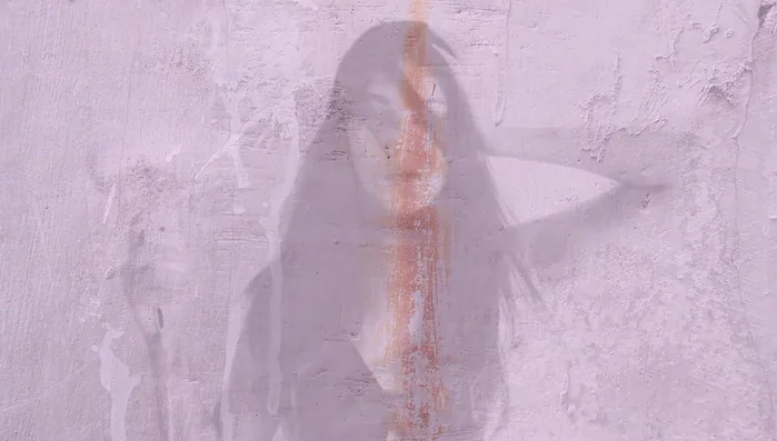 Apply heat from a hair dryer to loosen the hairspray.