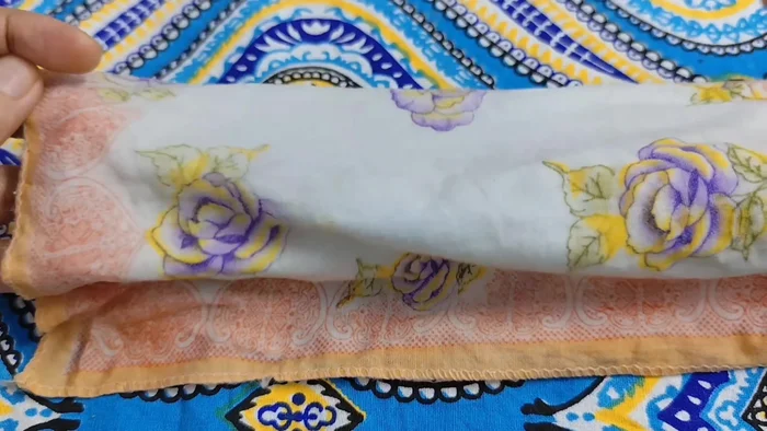 Slightly dampen a soft cloth.