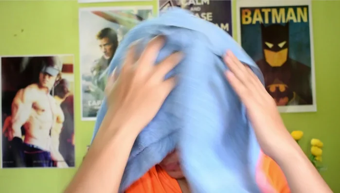 Towel dry your hair to remove excess water.