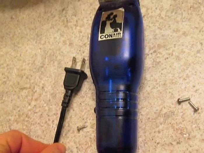 Clean out accumulated hair and debris from the clipper's housing and around the blades.