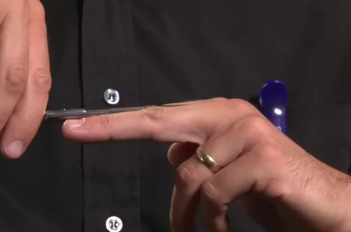 When cutting over the knuckles, drop your elbow for a relaxed position.