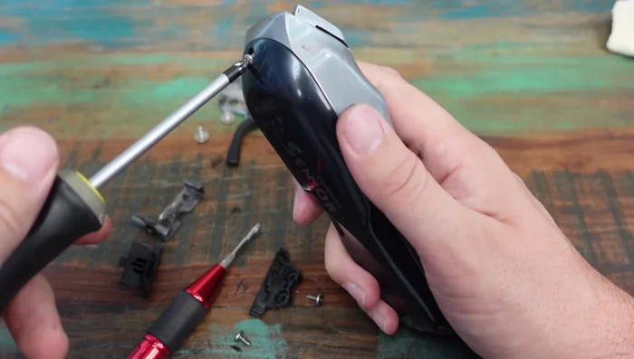 Use a small tool to scrape off remaining gunk around the edges and ensure a clean seal when reassembling.