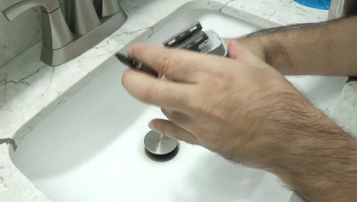 Cleaning Andis Profoil shaver with brush