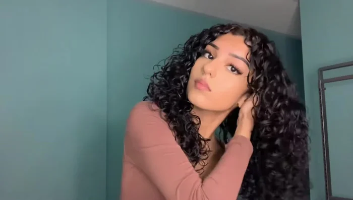 Scrunch out the crunch: After diffusing, gently scrunch out the crunch with argan oil to soften your curls.