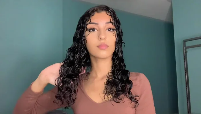 Create a gel cast: Hover the diffuser over your hair on medium heat and medium air to harden the gel, reducing frizz and locking in moisture.