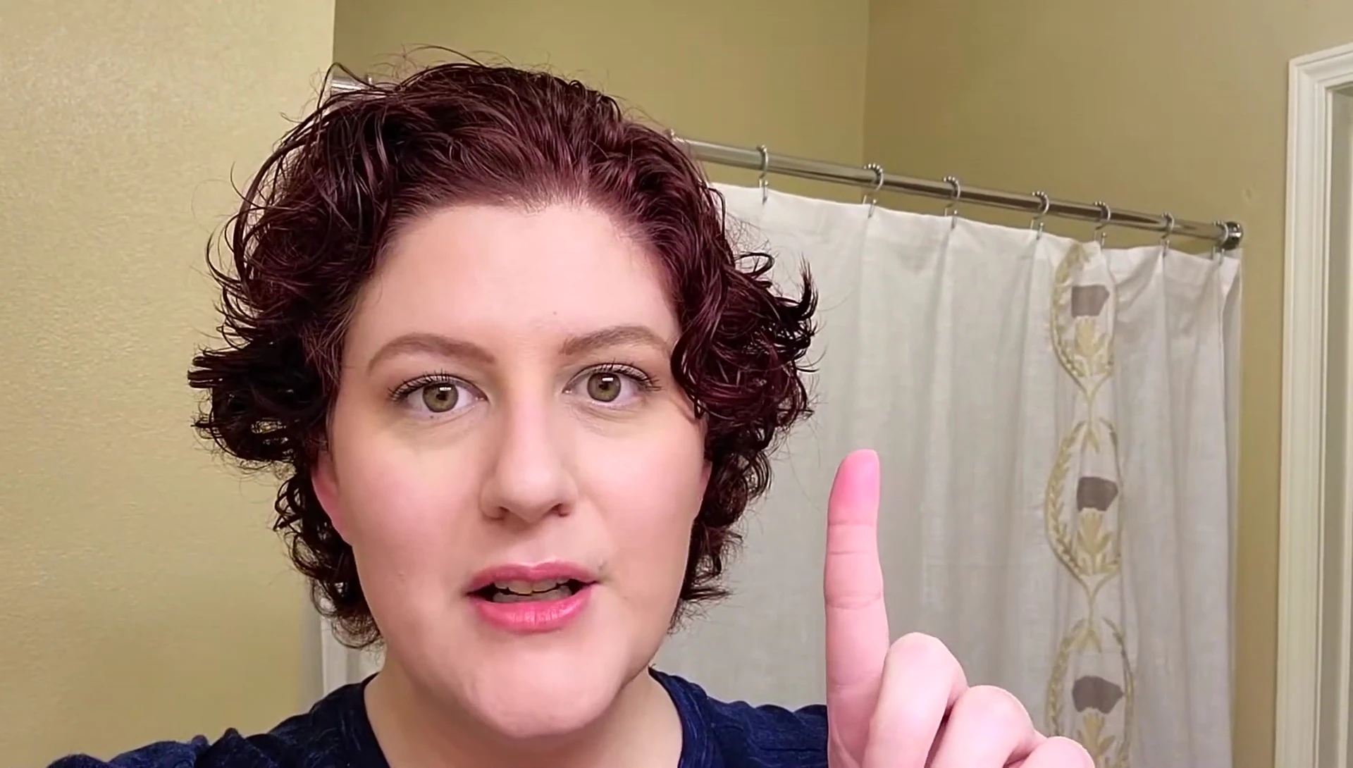 Woman with dark auburn hair after dye.