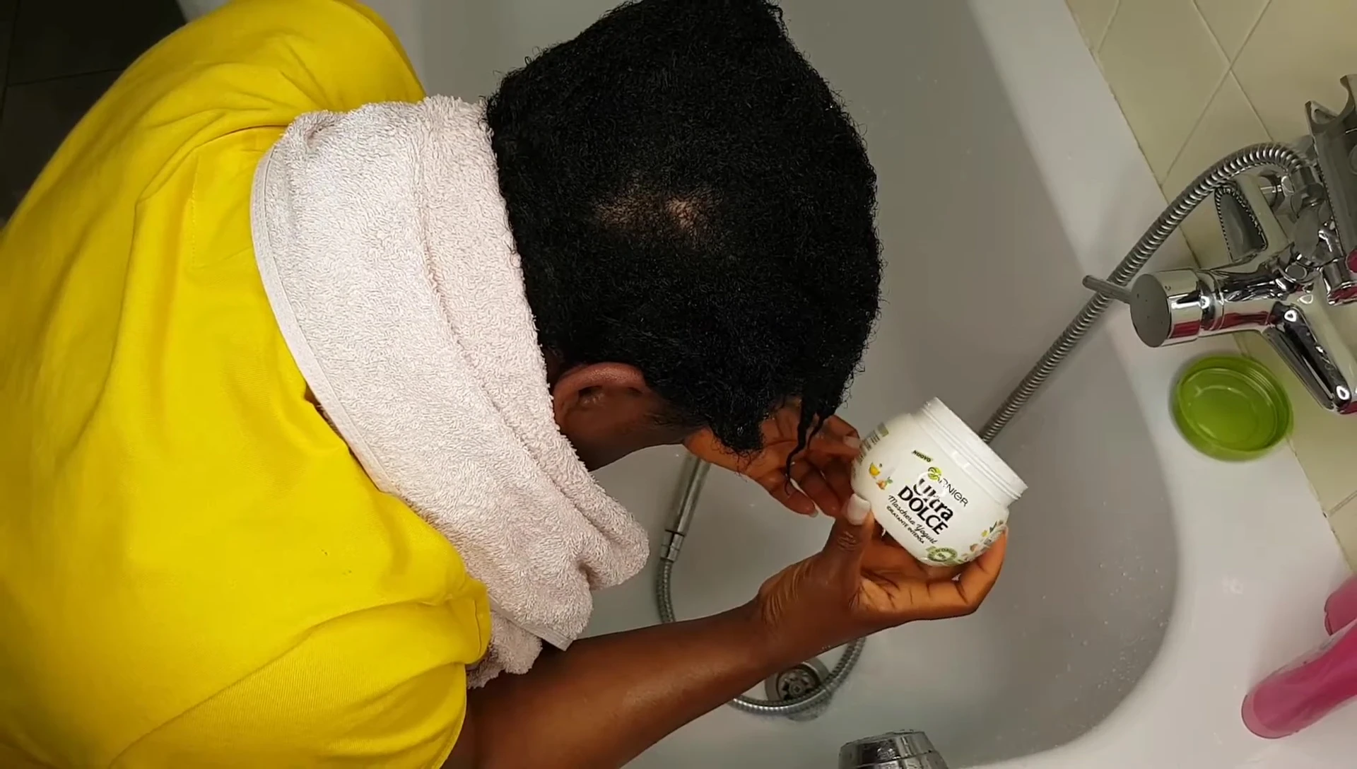 Applying the hair mask.