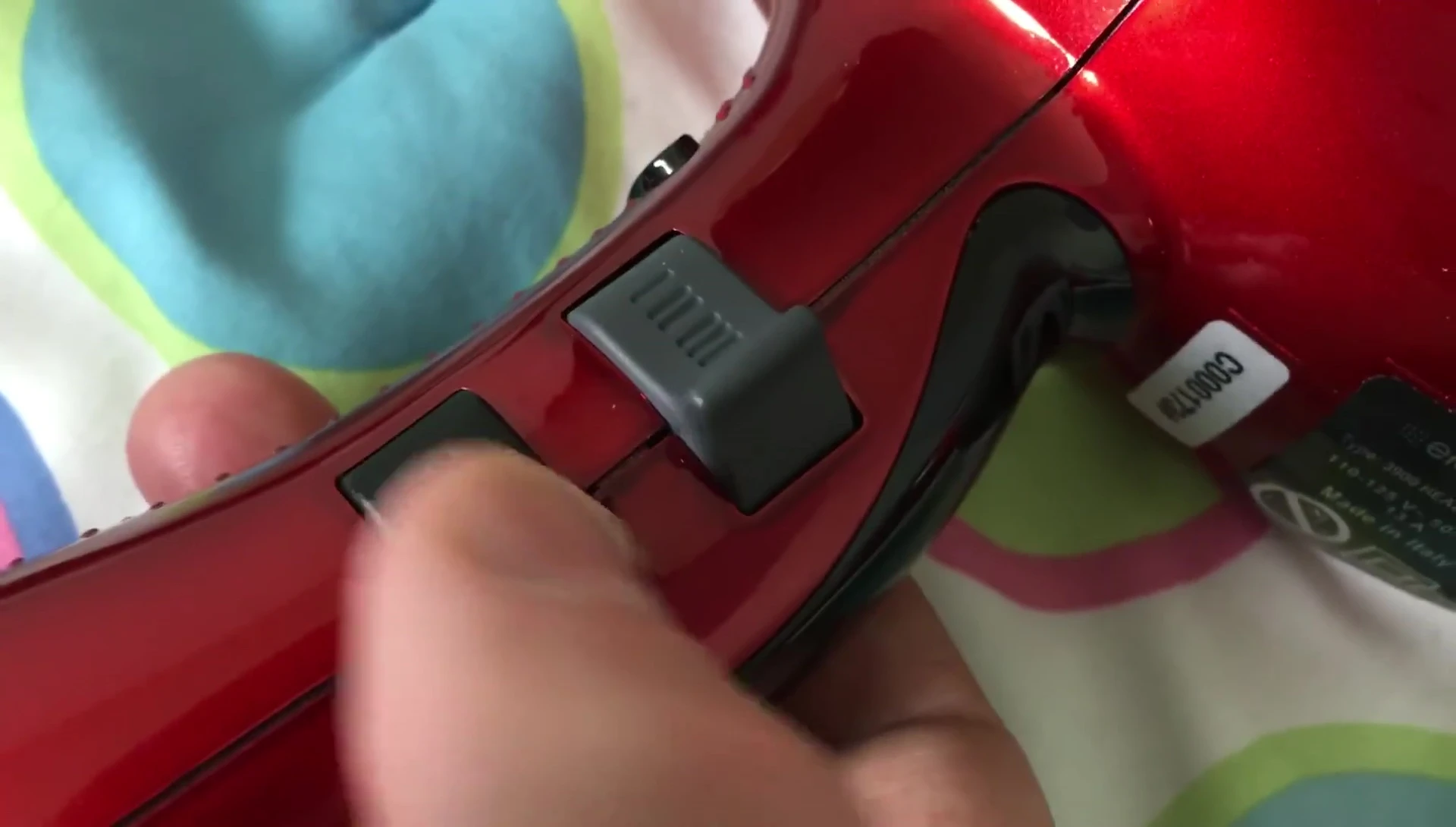 Demonstration of the slight movement of Elchim 3900's switches, highlighting a potential weakness.
