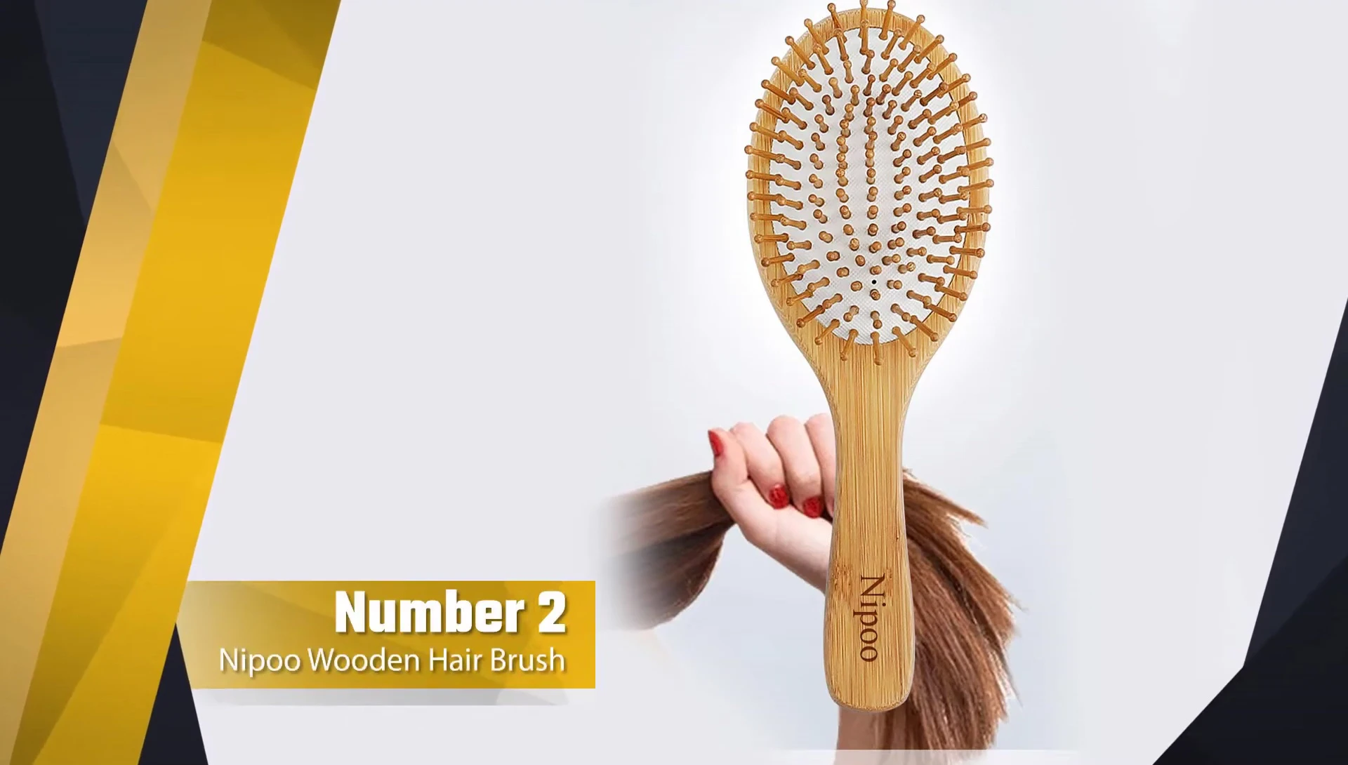 The Niplple wooden paddle brush