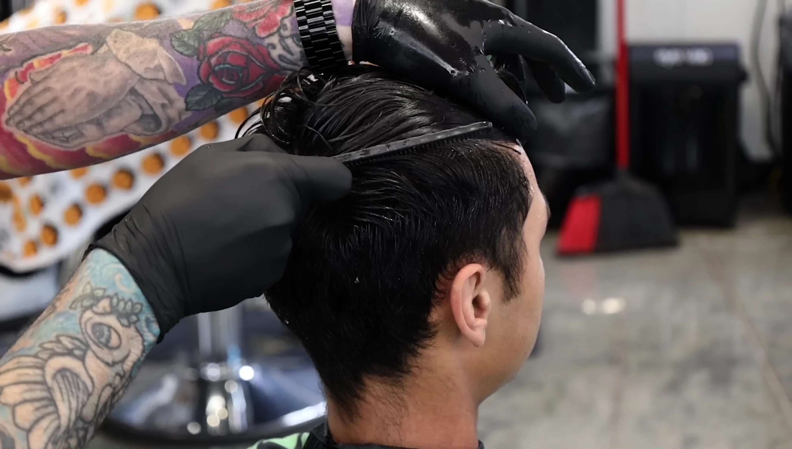 Stylist sectioning the hair
