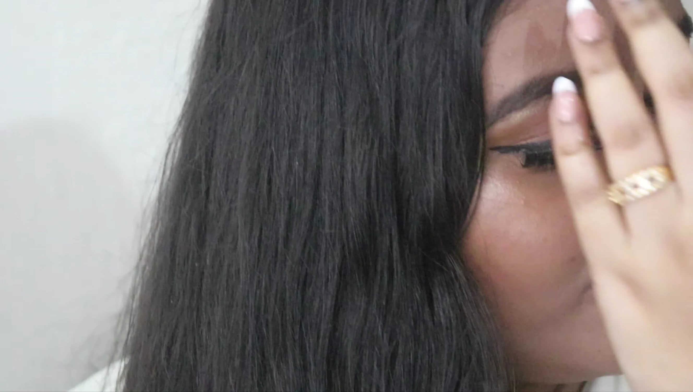After picture showcasing the smoother, shinier hair after applying the serum.