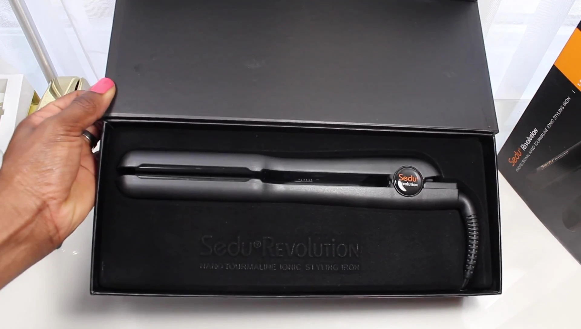 The flat iron revealed from the box