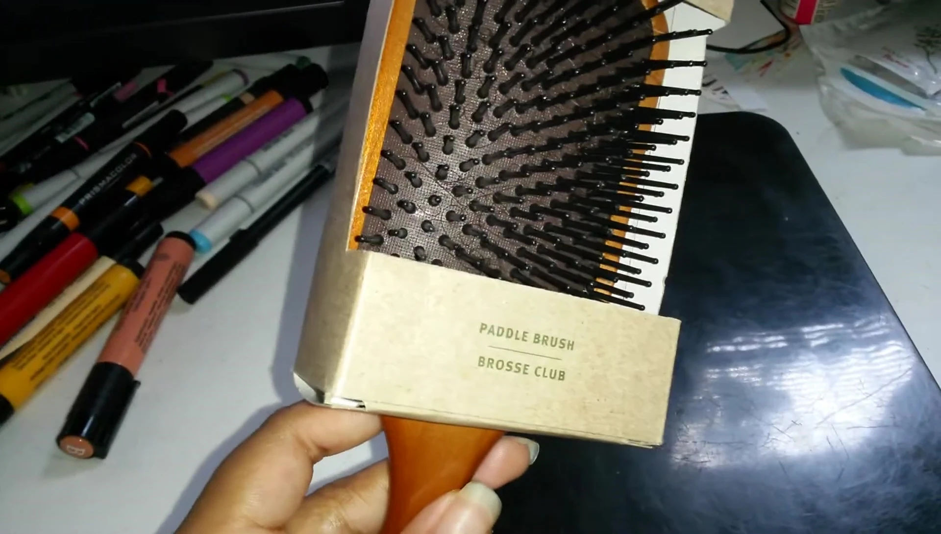The reviewer expressing positive feelings about the brush's feel.