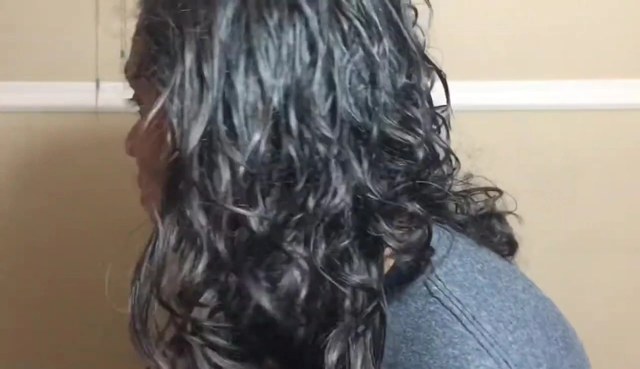 Close-up shot highlighting the shine in the YouTuber's hair.