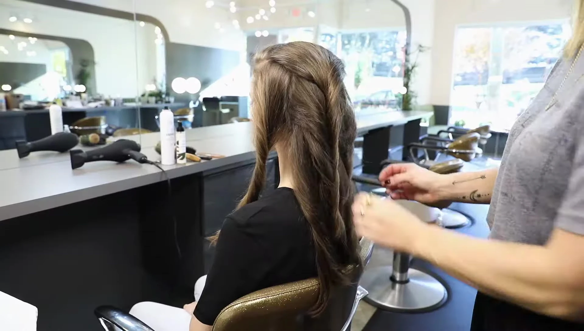Gently brushing the hair after round brushing