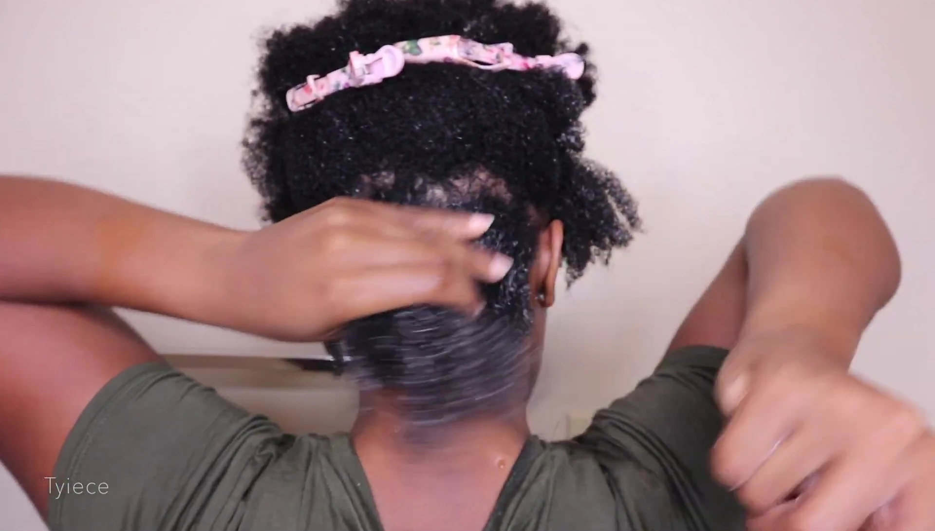 Using a spray bottle to keep hair moist