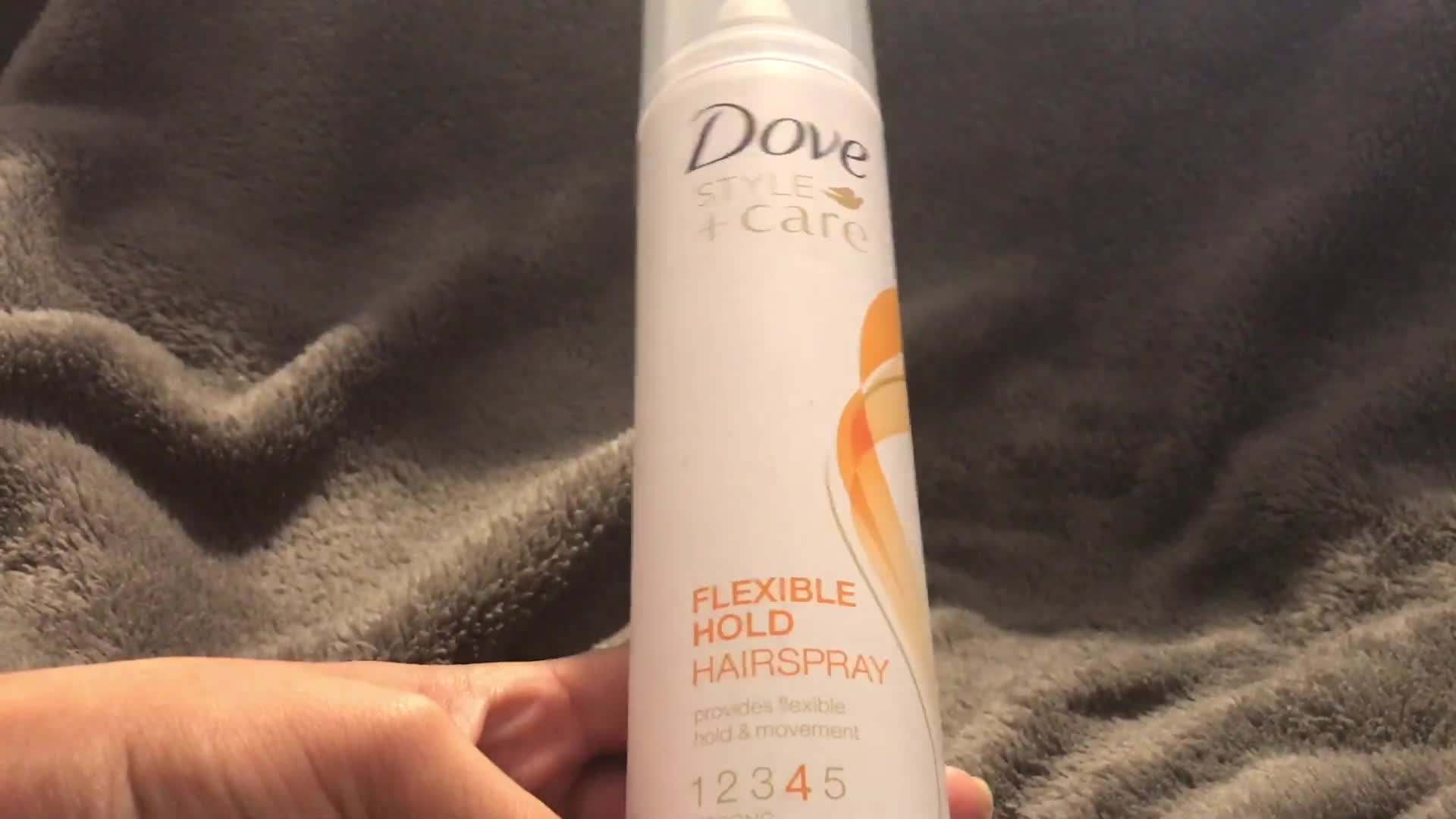 Close-up of hair demonstrating flexibility after applying hairspray.