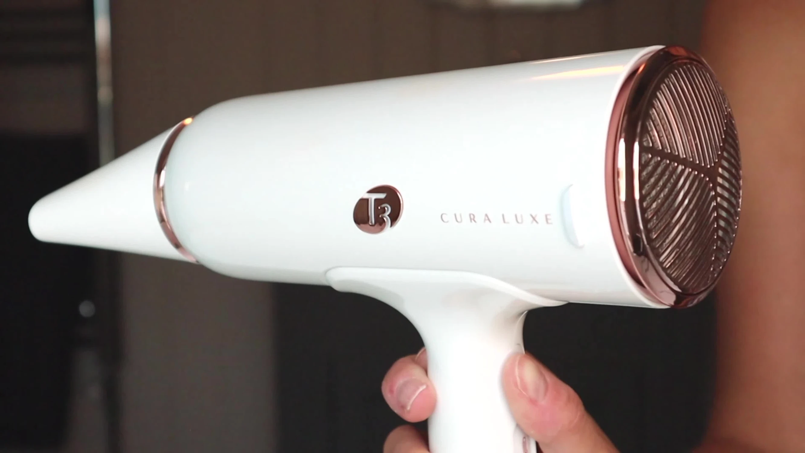 The hairdryer being removed from its packaging