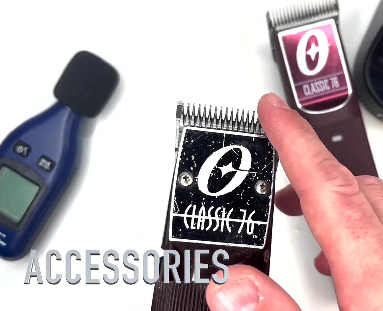 Close-up shot of the accessories included with the corded Oster Classic 76.