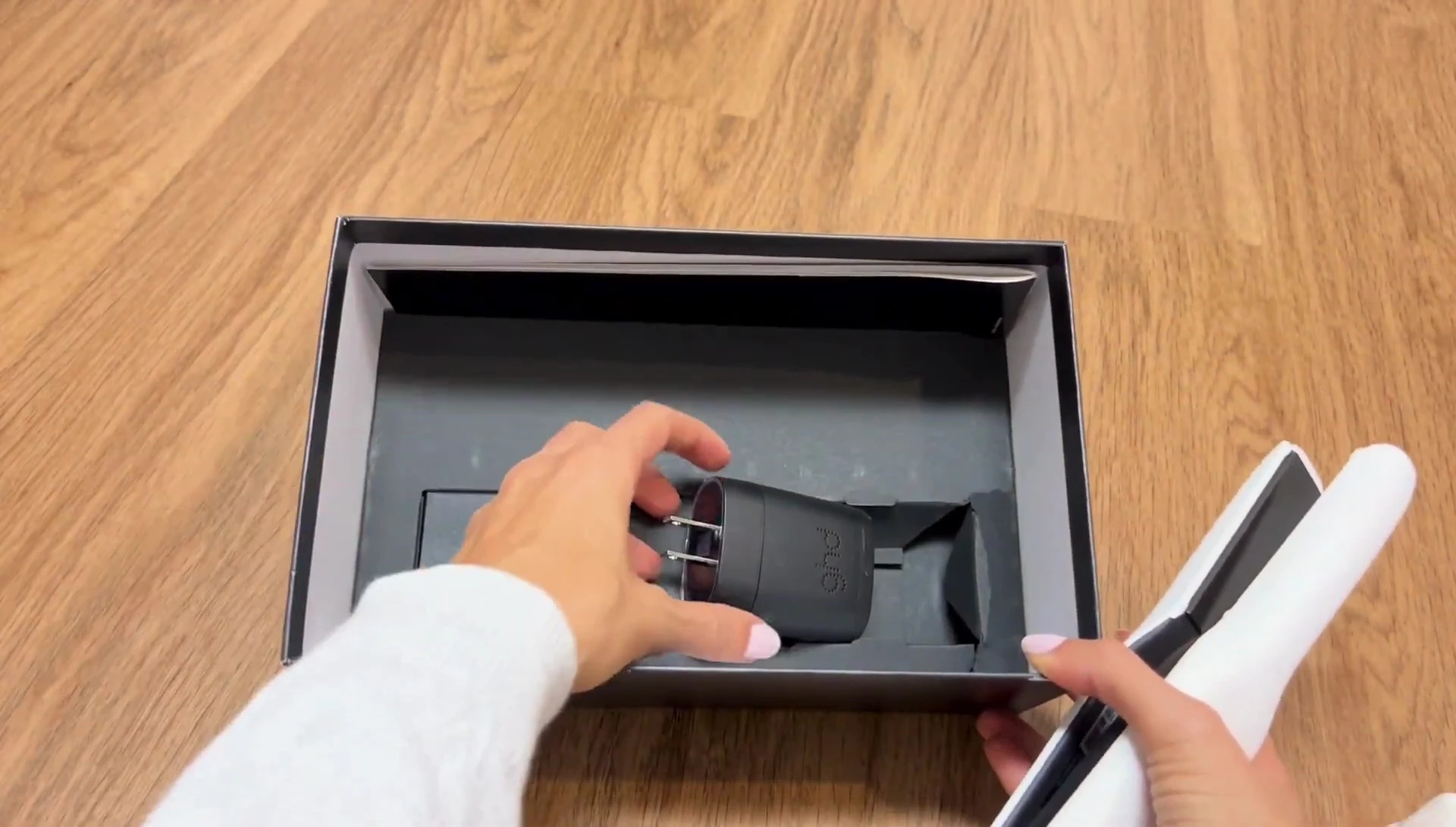 The ghd Unplugged charger shown.