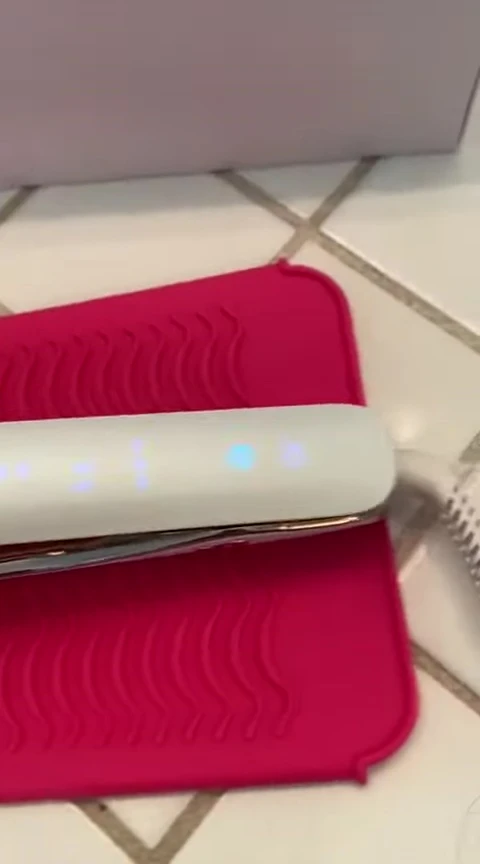 Reviewer demonstrating the power button
