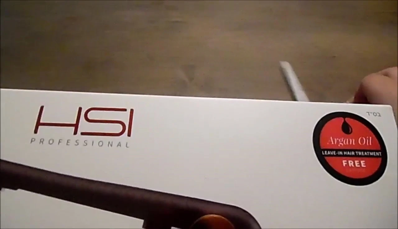 The HSI Glider Ceramic Flat Iron in its packaging