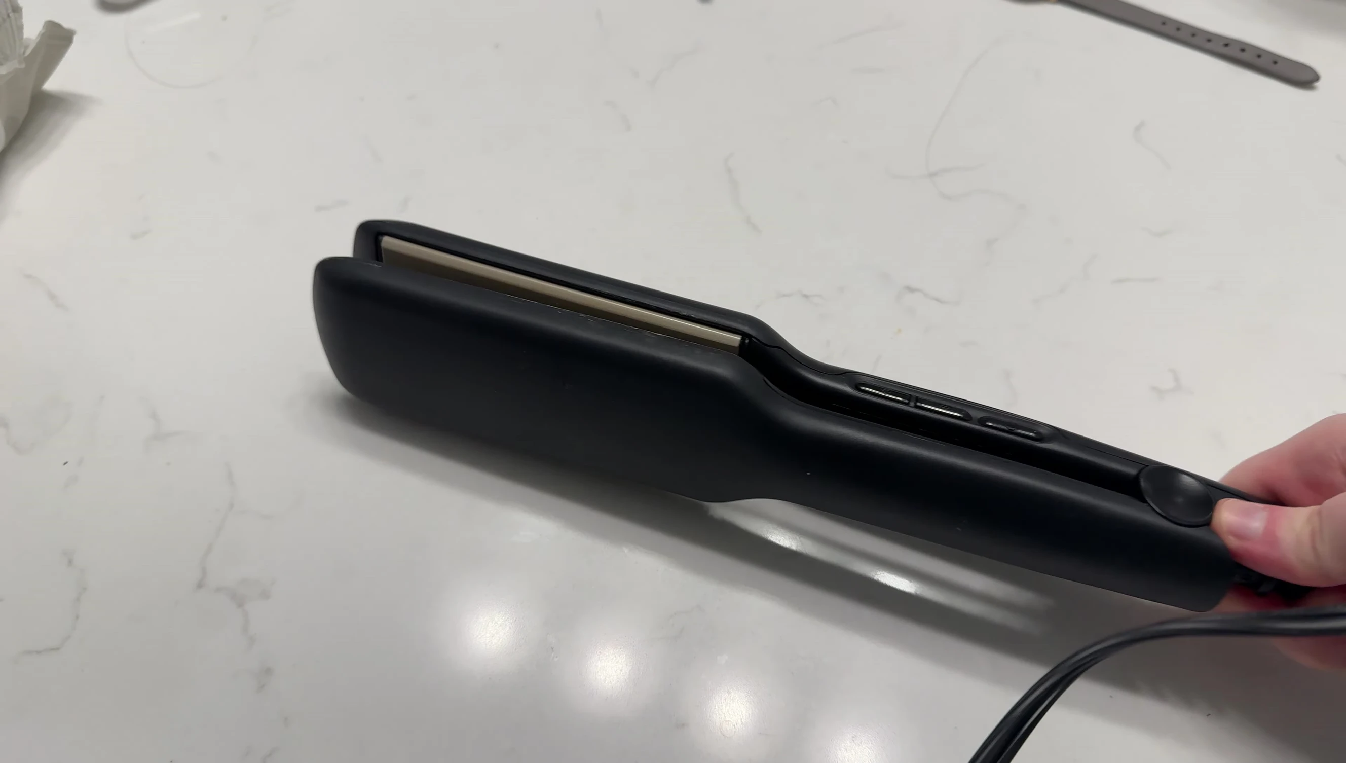A shot demonstrating the straightener's effectiveness on hair.