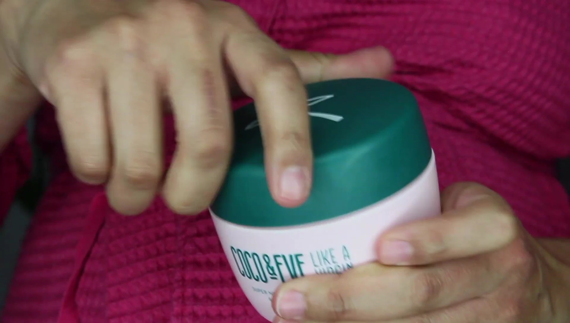 The reviewer demonstrating the ease of detangling