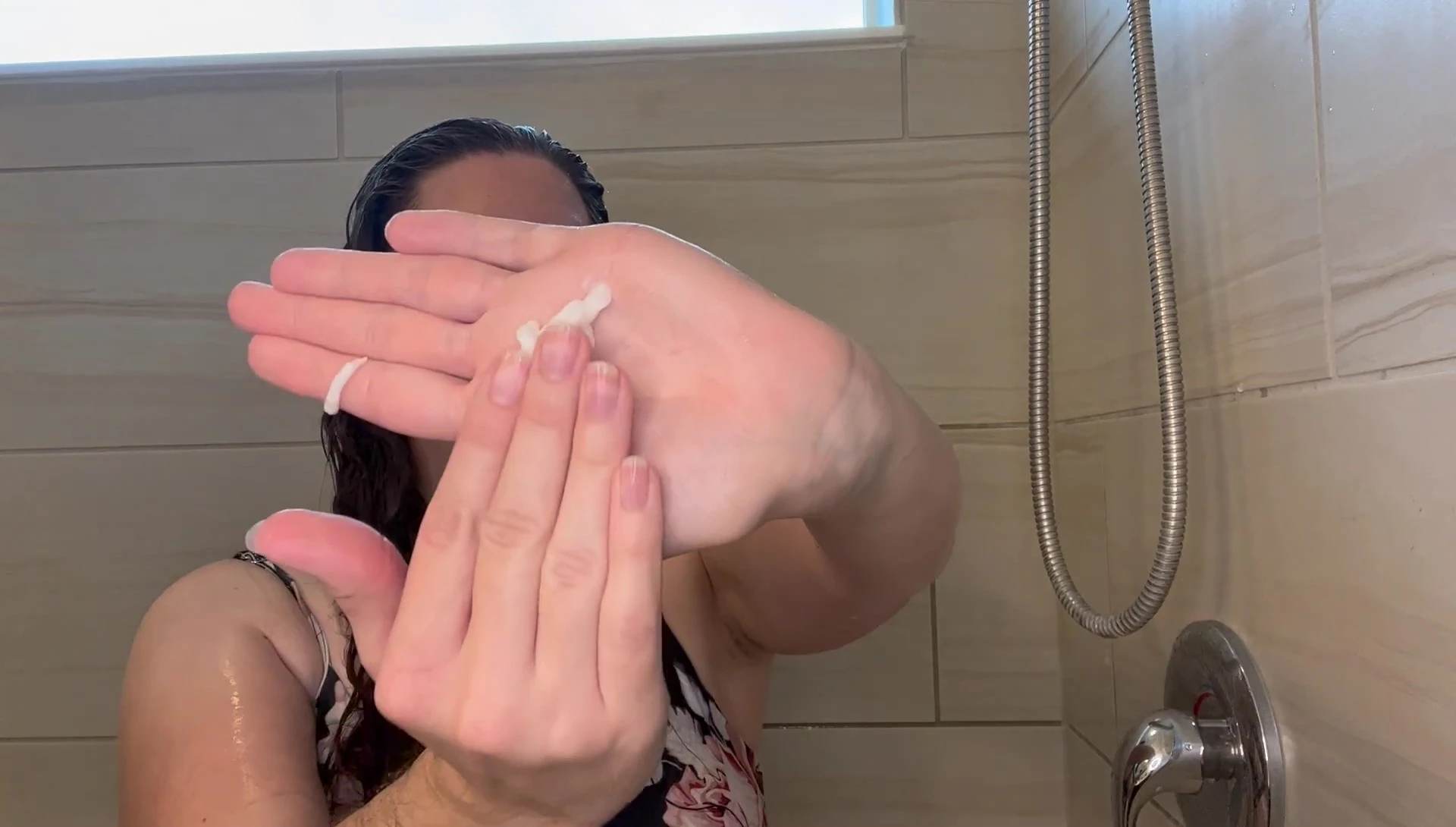 The conditioner being applied to hair