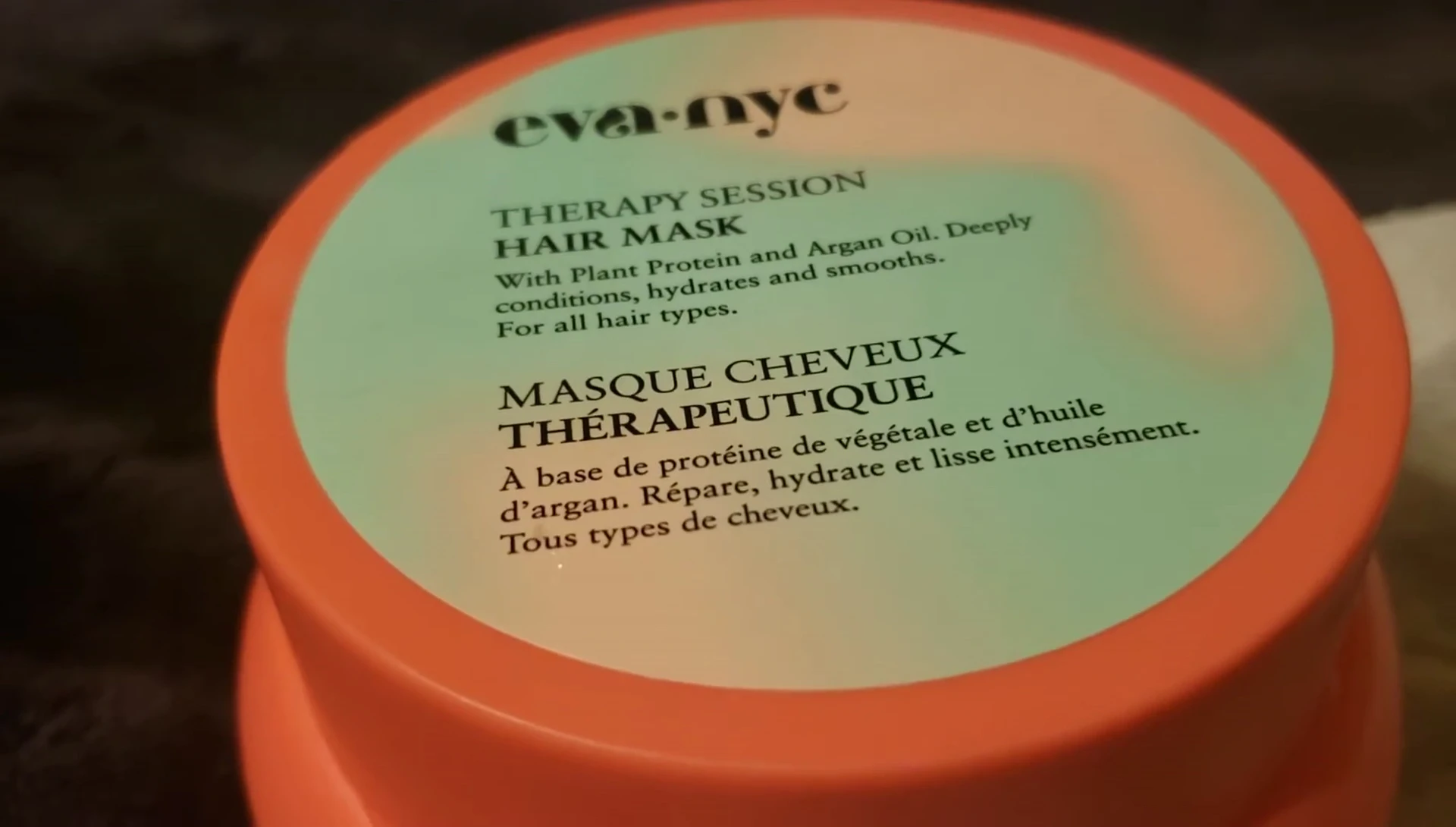 The reviewer showing her hair again after a second application of the mask.