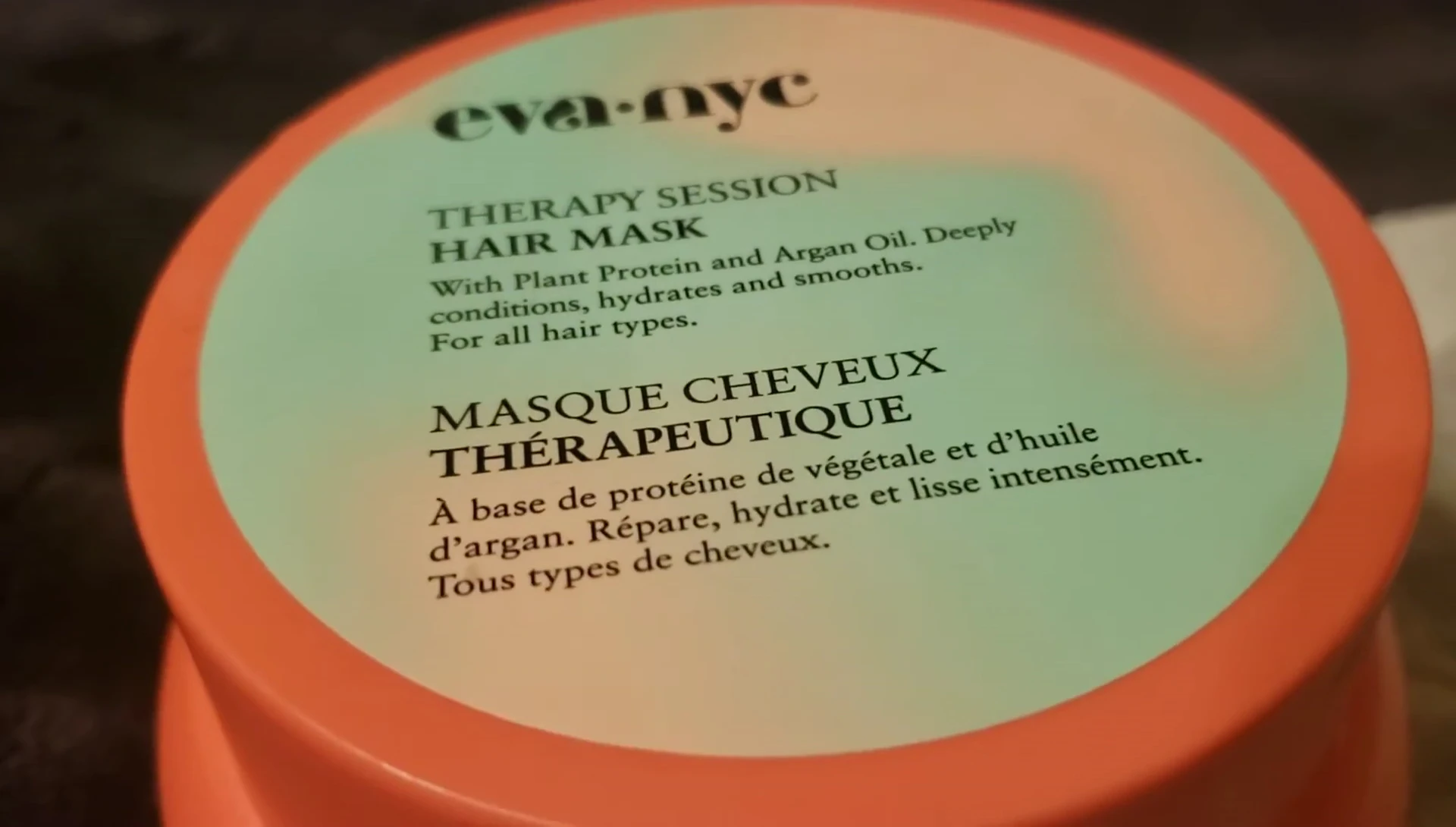 Close-up of the Eva NYC Therapy Session Hair Mask packaging.